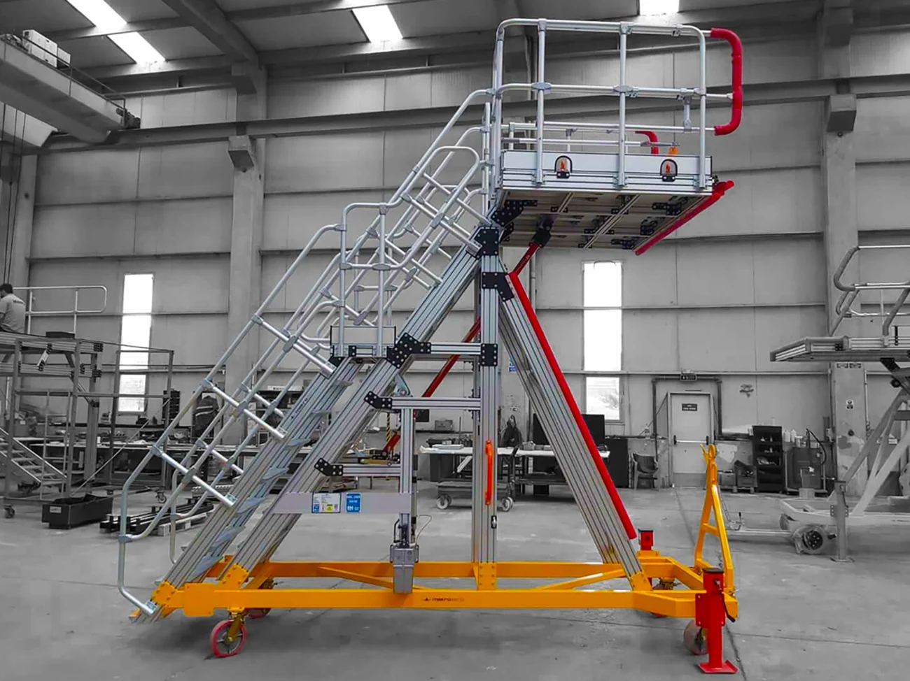 A technical illustration of a height-adjustable windshield stand for narrow-body aircraft, used for installation and maintenance.